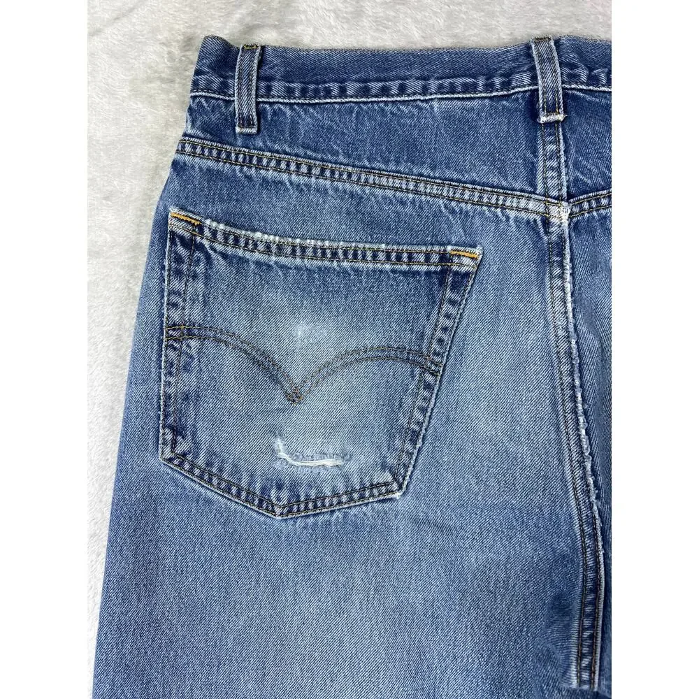 Vintage Levi's 550 Distressed Jeans 38x30 Made in USA Light Wash